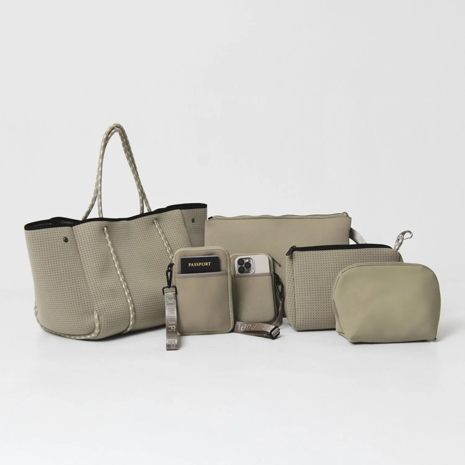 TAUPE SET: EVERYDAY TOTE   OVERSIZED WRISTLET POUCH   ESSENTIAL POUCH   MAKEUP POUCH SET   PASSPORT WALLET   PHONE BAG